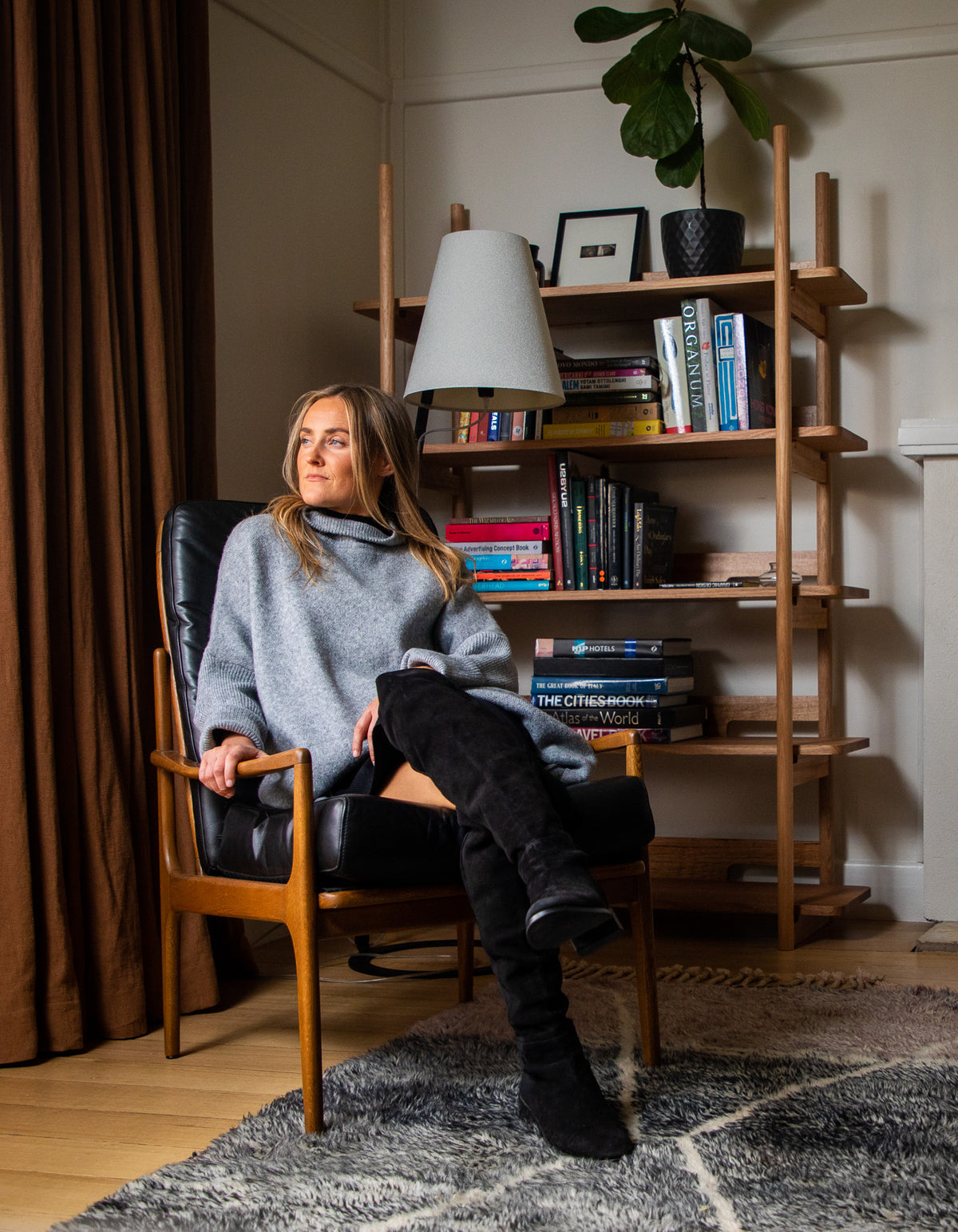 Oversized grey brushed knit jumper featuring a funnel neck, drop shoulders, and long ribbed sleeves.
