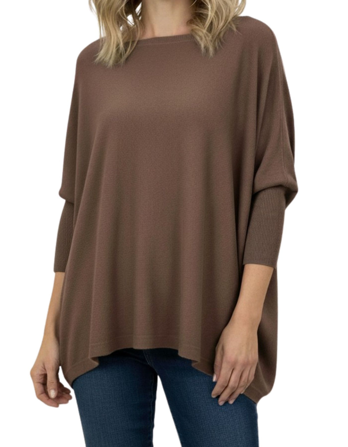 Front half-body shot of the brown Karma Kameleon jumper displaying the contrast of a loose drape and ribbed sleeves.